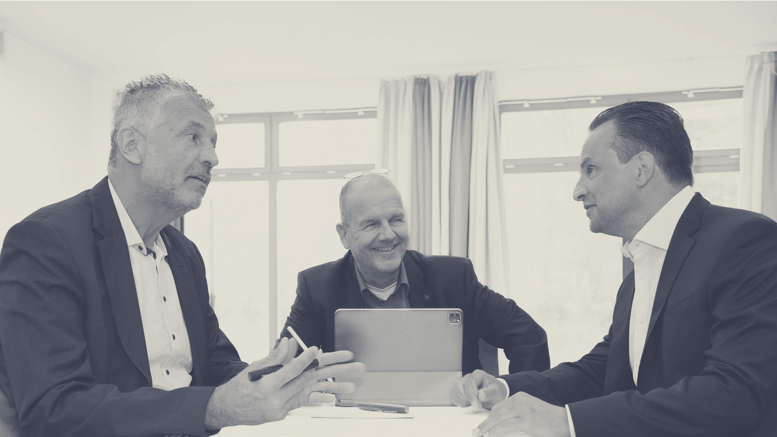 Unsere Partner bei einer Besprechung